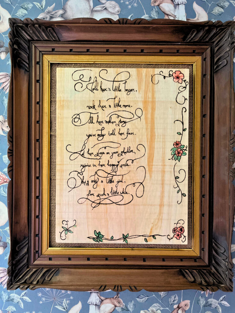 Wood burned poem with flowers in a wooden frame