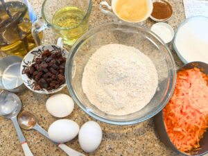 A table full of ingredients to make muffins.