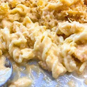 A close up of a platter of macaroni and cheese.