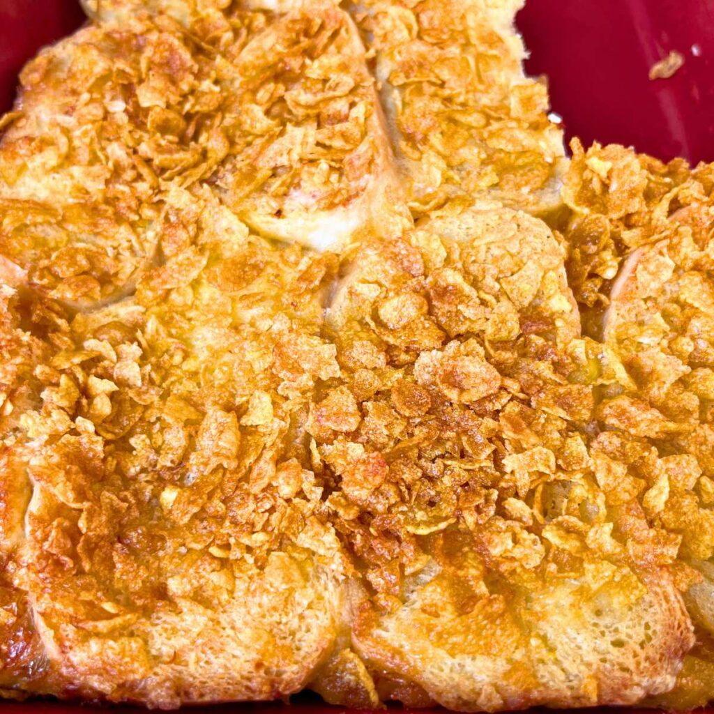 A breakfast casserole in a red dish.