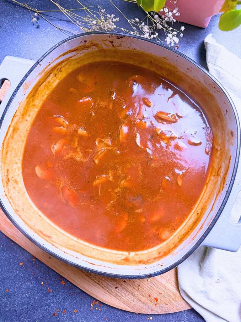 Mushroom gravy in a Dutch oven.