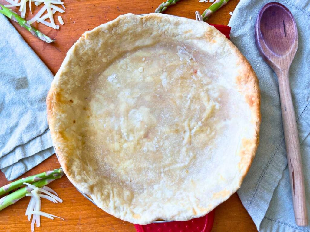 A blind baked pie crust.