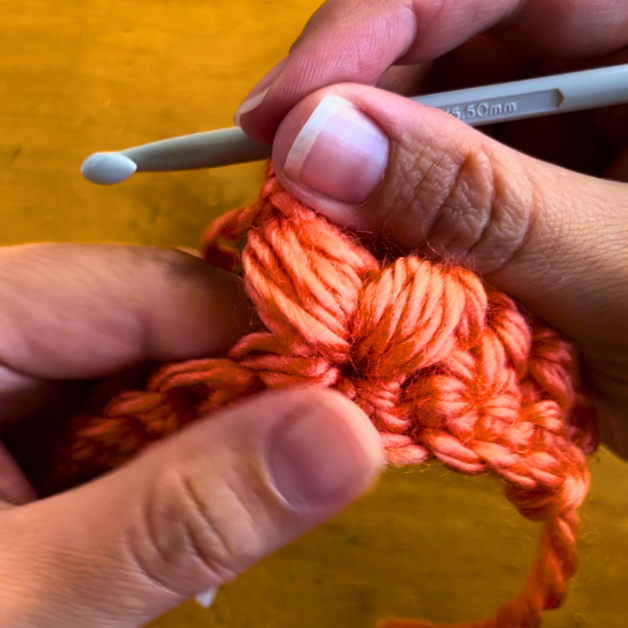 orange yarn double puff stitch