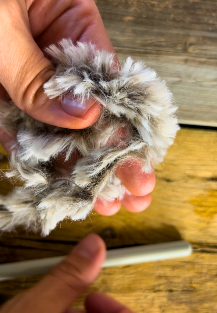 making a magic ring with faux fur yarn