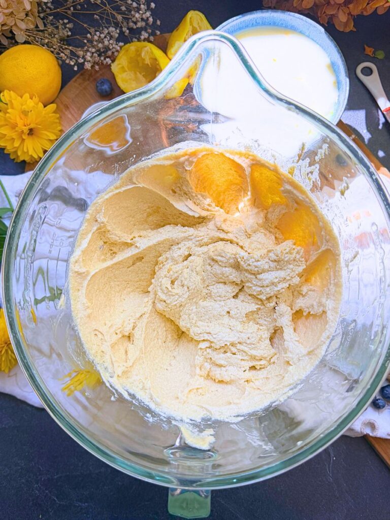 Creamed butter and sugar in a large glass bowl.