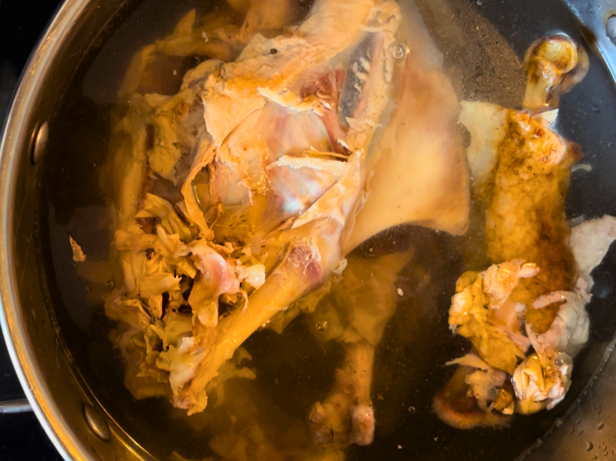 A turkey carcass in a large stockpot