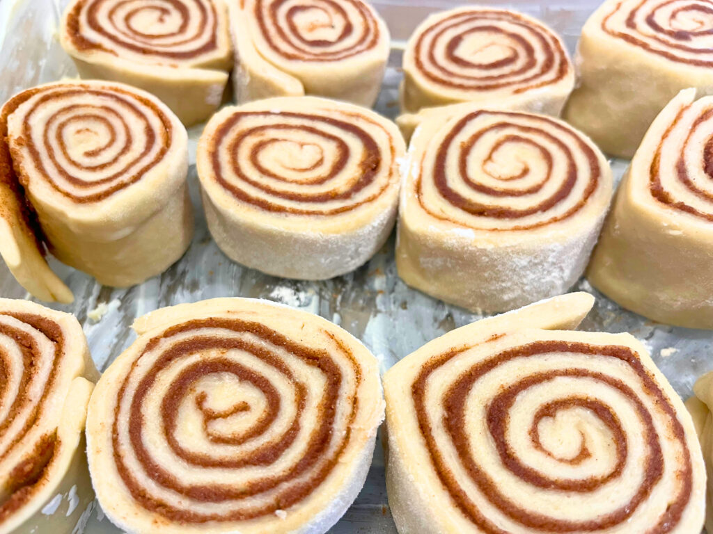 Risen cinnamon roll dough ready to bake