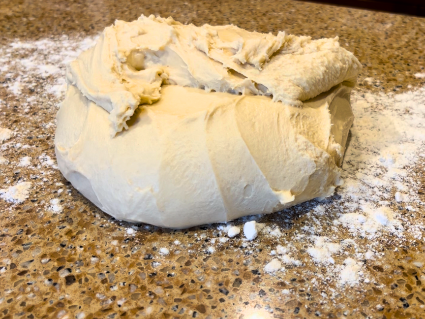 Pierogi dough on a floured countertop