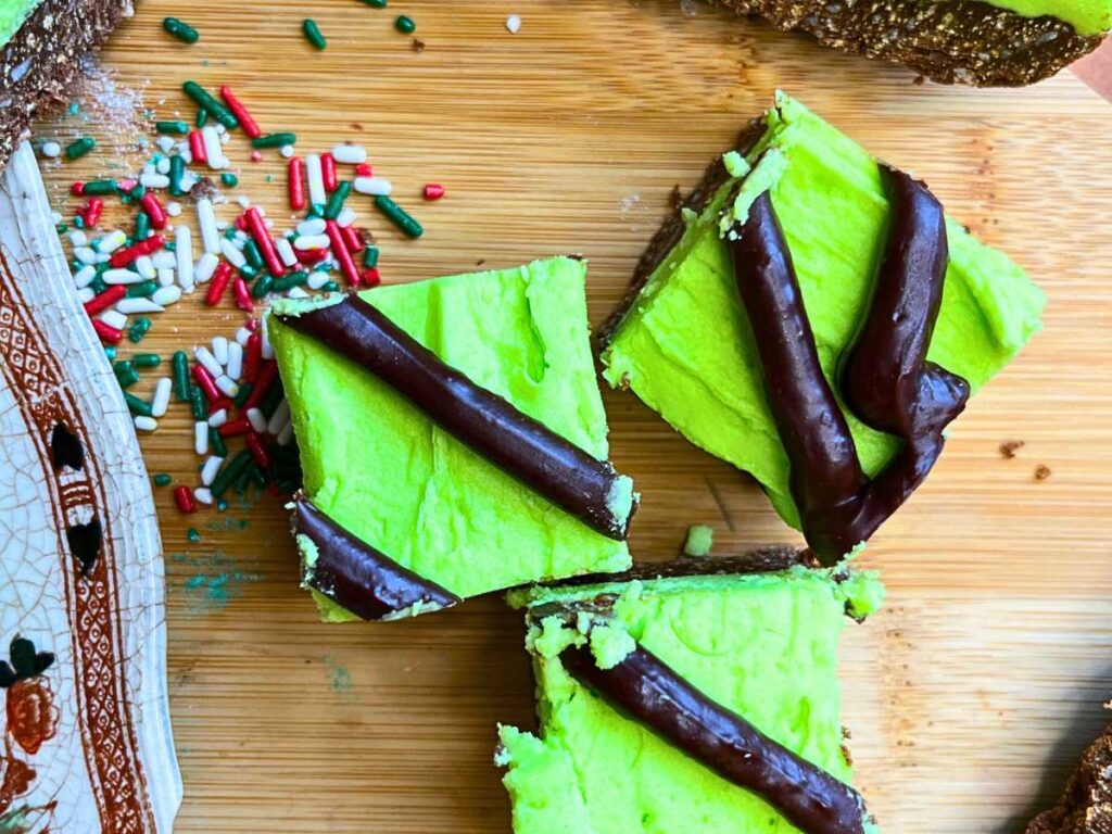 Three Chocolate mint bars surrounded by sprinkles.