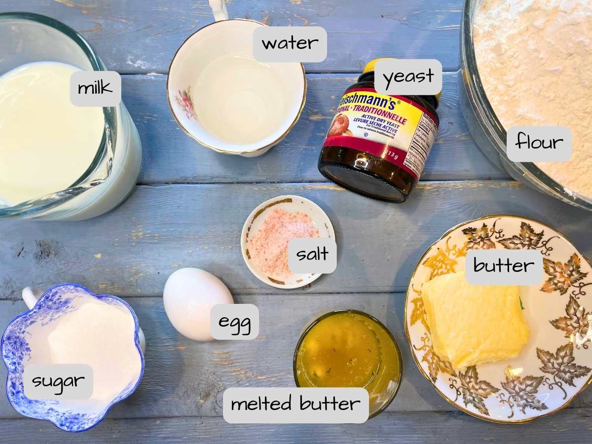 There is a blue table full of ingredients. They are labeled.