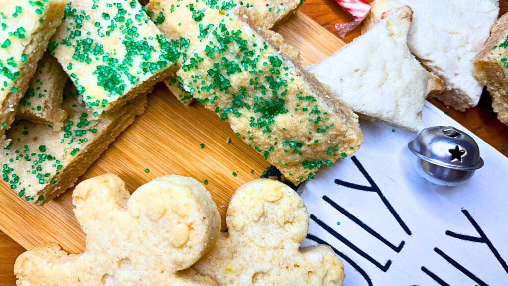 Shortbread cookies. Some are dusted in green sanding sugar, some are in the shape of gingerbread men, and some are wedge shap.