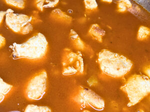 Chicken paprikash simmering on the oven.