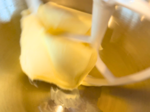 Butter in the bowl of a stand mixer, fitted with a paddle attachment.