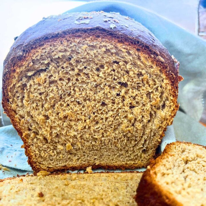 A view of the inside of a loaf of molasses brown bread.