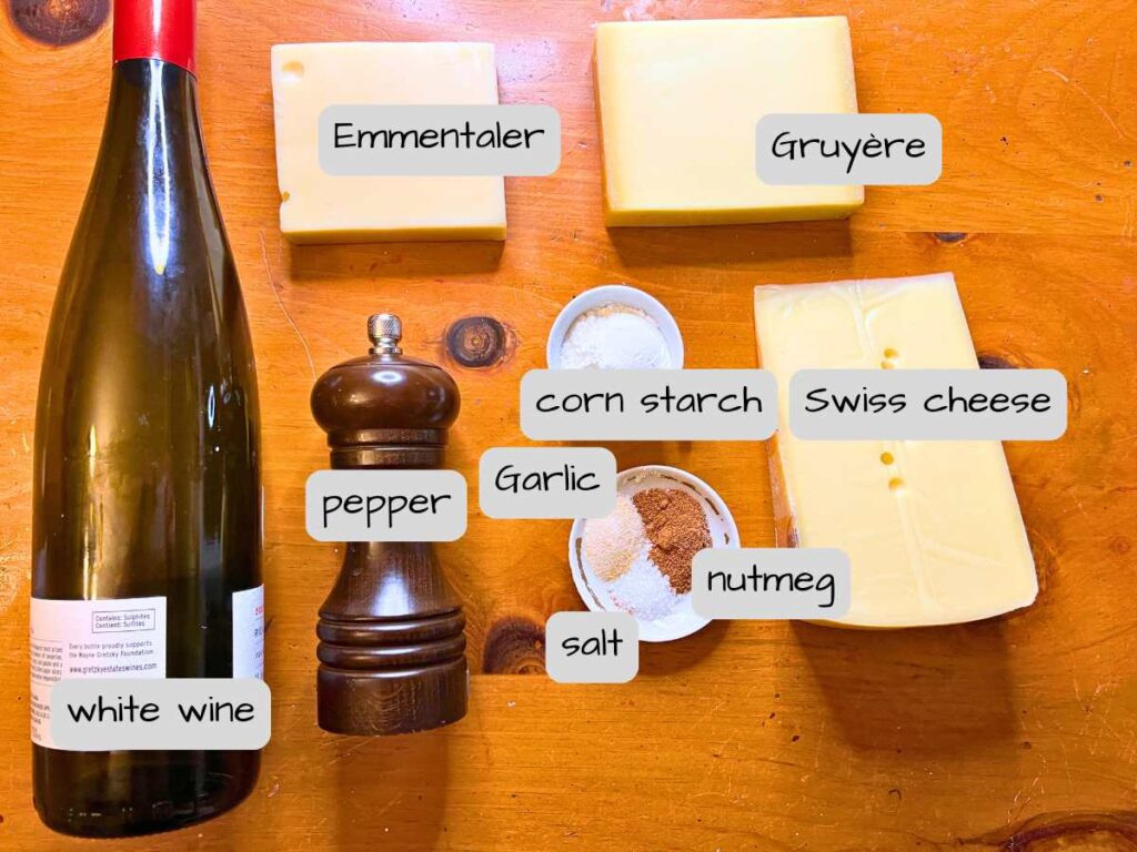 Ingredients on a wooden table. They are labeled.