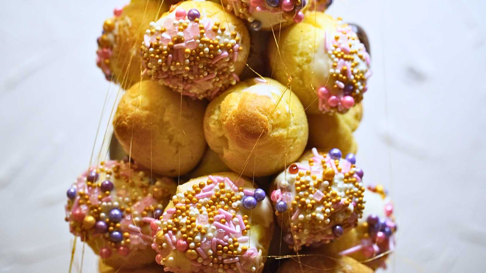 A closeup look at the profiteroles in a croquembouche.