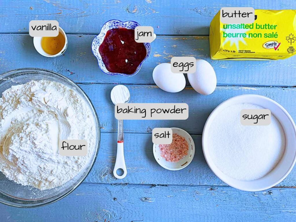 A blue table full of ingredients. They are labeled.