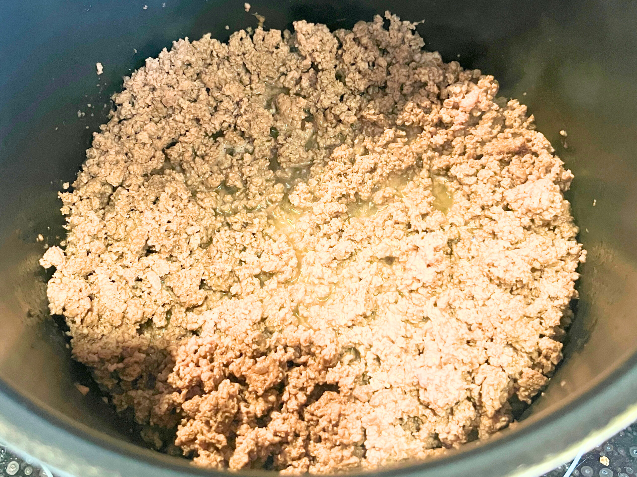 A pot of cooked ground beef