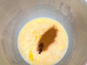 A liquid yeast mixture and spices sprinkled on top.