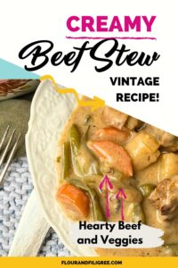 A pinterest pin for creamy beef stew. There is a close up picture of a white bowl with a beef and vegetable stew inside.