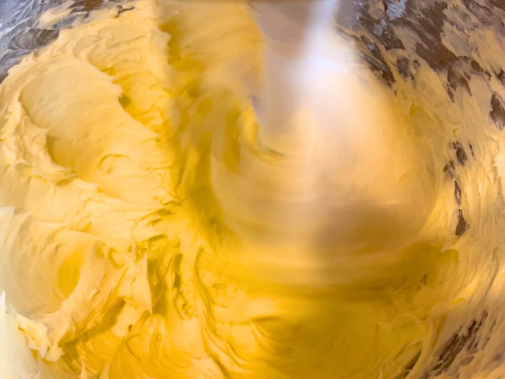 Butter and cream cheese being mixed together