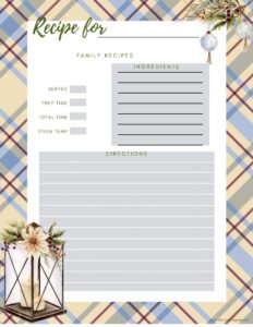 A blue and tan plaid blank recipe card. There is a floral lantern graphic and a Christmas ball decoration