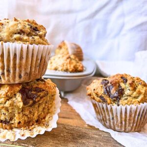 A table full of oatmeal banana chocolate muffins.