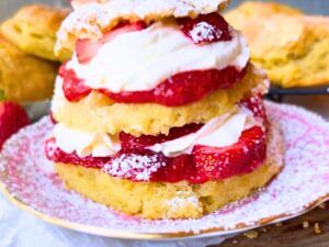 A close up look at the layers of a strawberry shortcake.