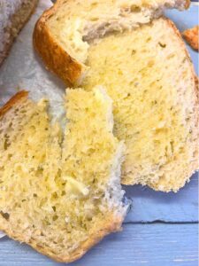 There is a close up look of slices of bread with zucchini baked inside. 