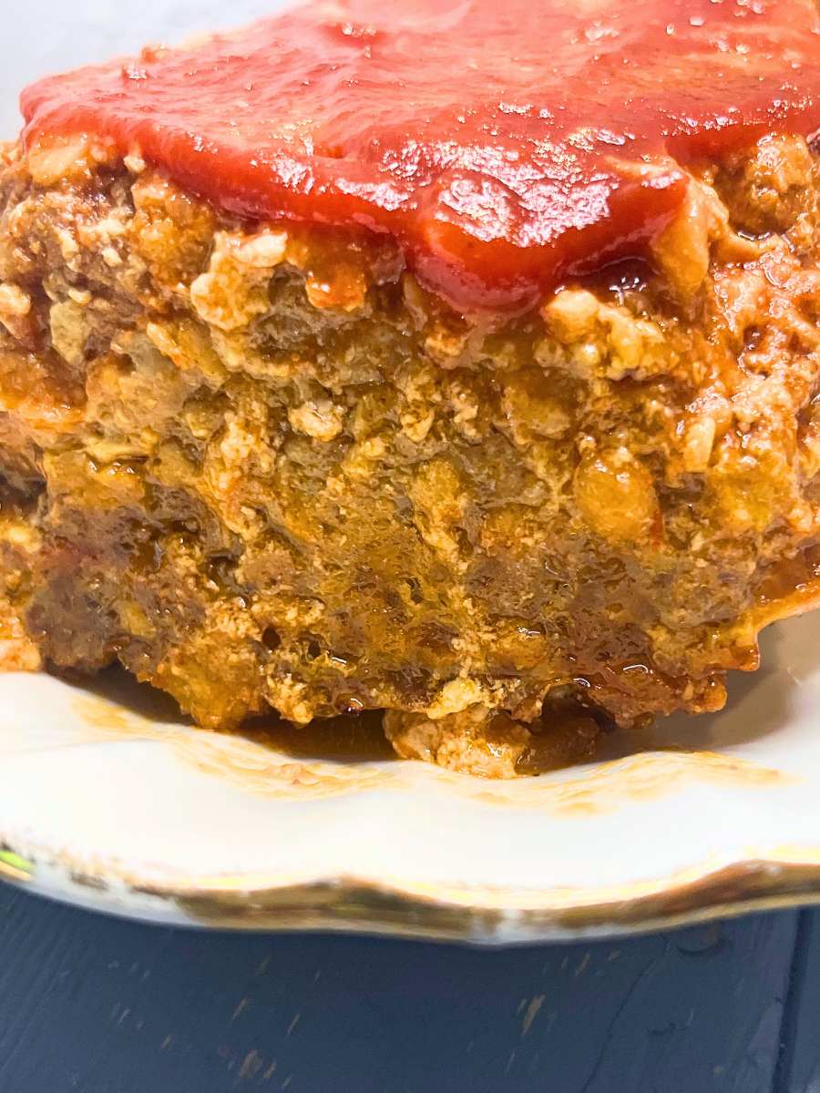 There is a close up view of the side of a meatloaf.