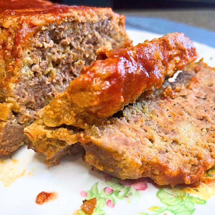 There is a meatloaf that has been sliced.