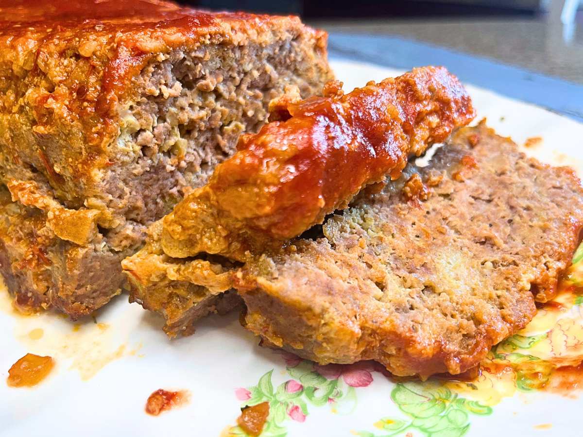 There is a meatloaf that has been sliced.