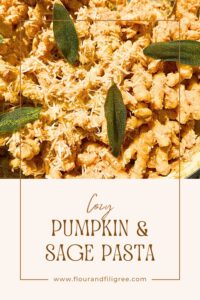 A pinterest pin. There is a close up look at a pumpkin pasta with grated cheese and sage leaves on top.