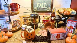 A fall themed drink station with coffee and chocolate supples.