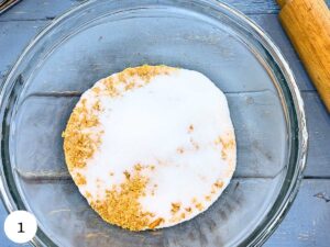 There is a glass bowl with graham crackers, and sugar.