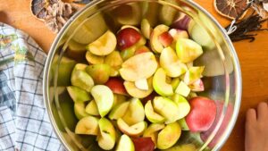 A bowl full of chopped apples.