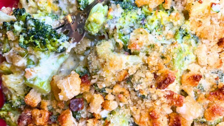 An over head look at a broccoli casserole with a bread crumb crust.