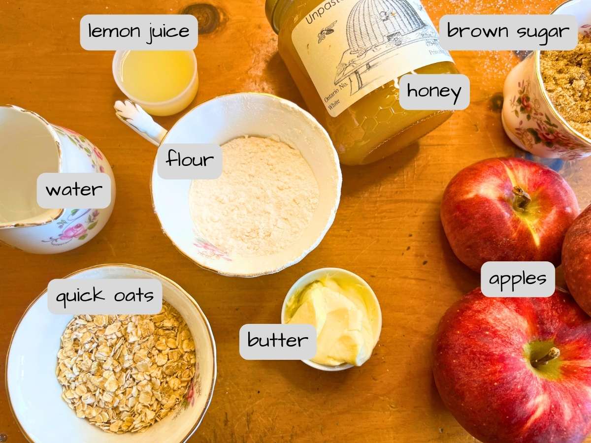 There is a wooden table full of ingredients. They are labeled.