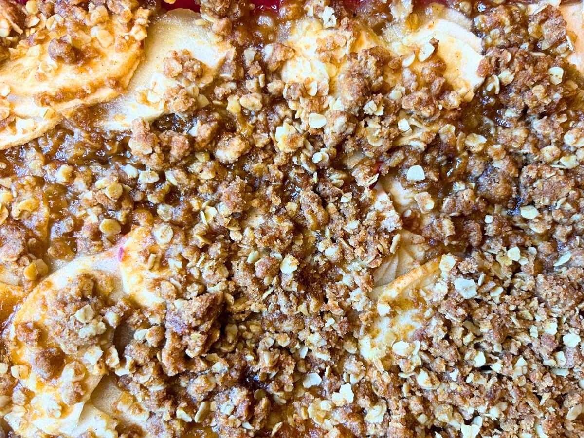 A close up view of a honey apple crisp topping.