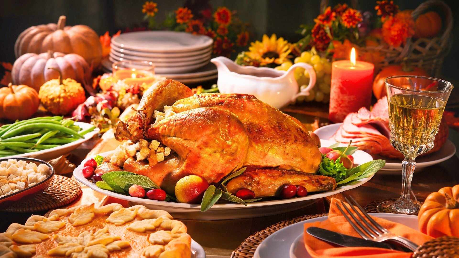 A thanksgiving table with food on display.