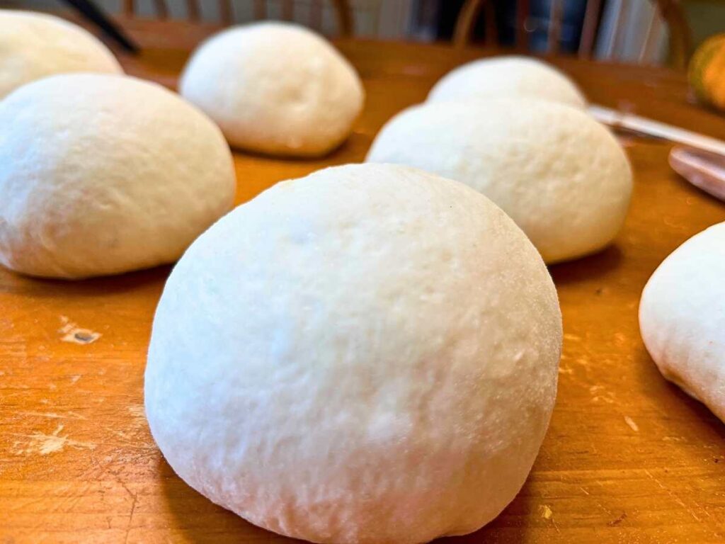 A close up look at a small bread boule.