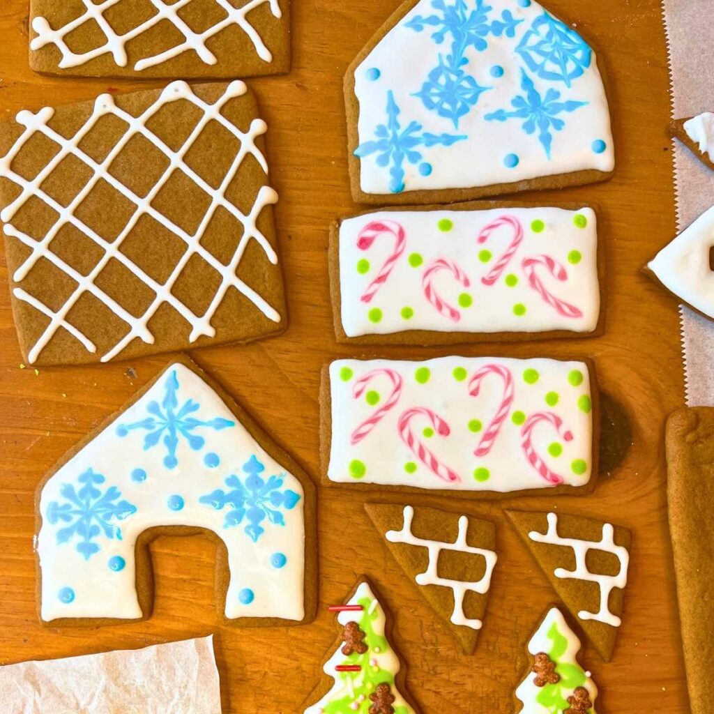 Gingerbread house cookies decorated with icing.