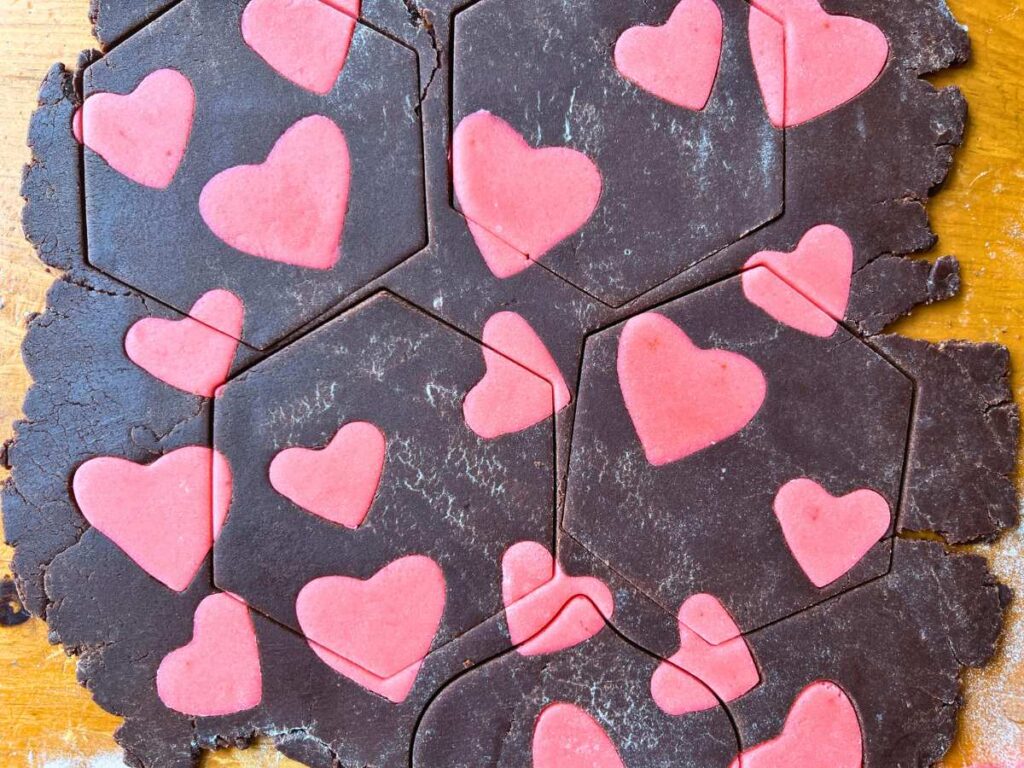 A chocolate and pink heart cookie dough.