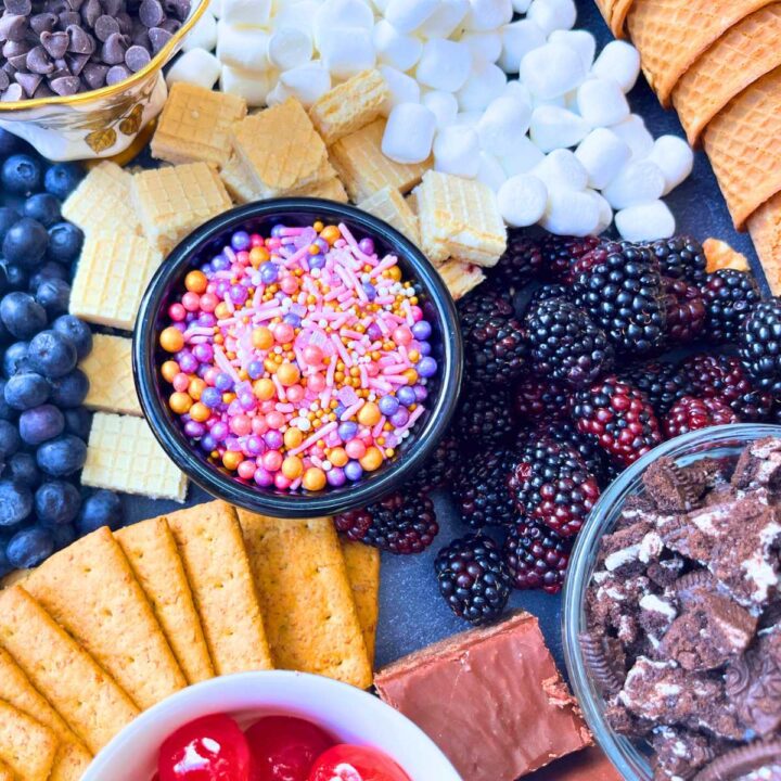 A table full of ice cream toppings.