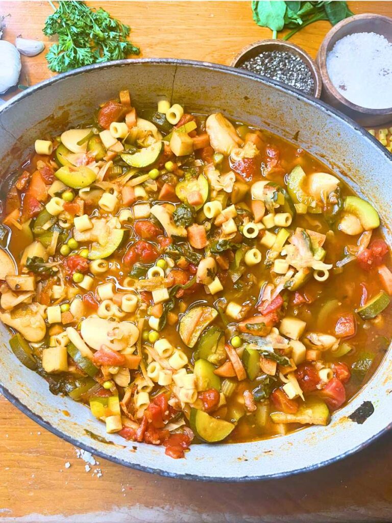 Cooked minestrone soup in a large Dutch oven.