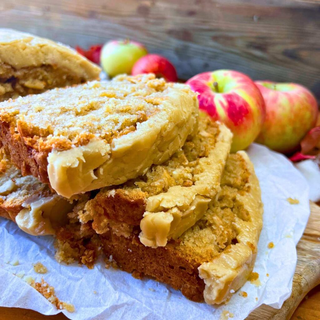 A side view of slices of apple caramel loaf cake.