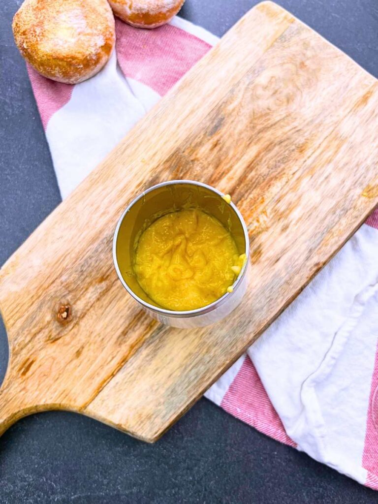 Hollandaise sauce in a thermal mug.