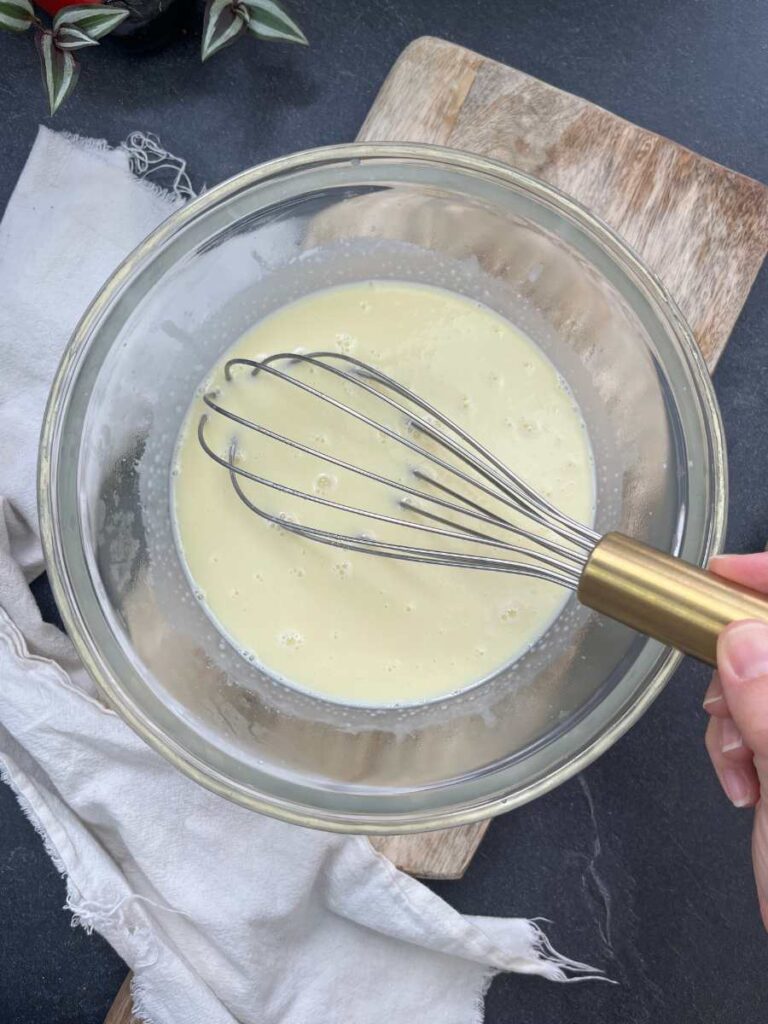 White chocolate and hot 35% cream melted together.