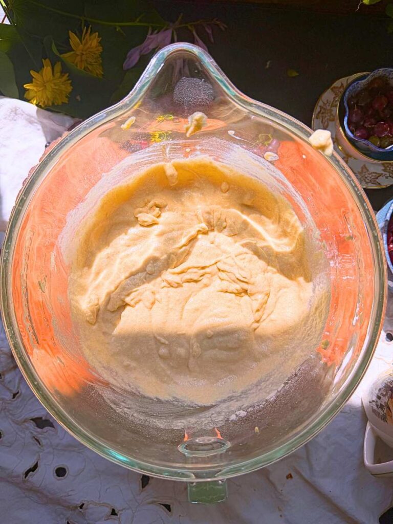 Coffee cake batter in a glass bowl.