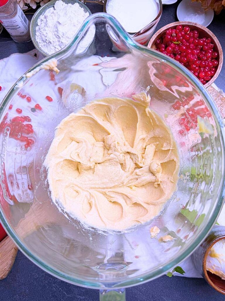 Creamed butter and sugar in a large glass bowl.